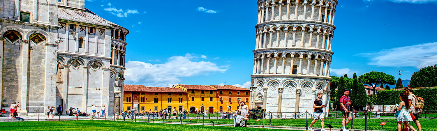 he image captures a vibrant scene at the Leaning Tower of Pisa, a renowned architectural marvel in Pisa, Italy. 