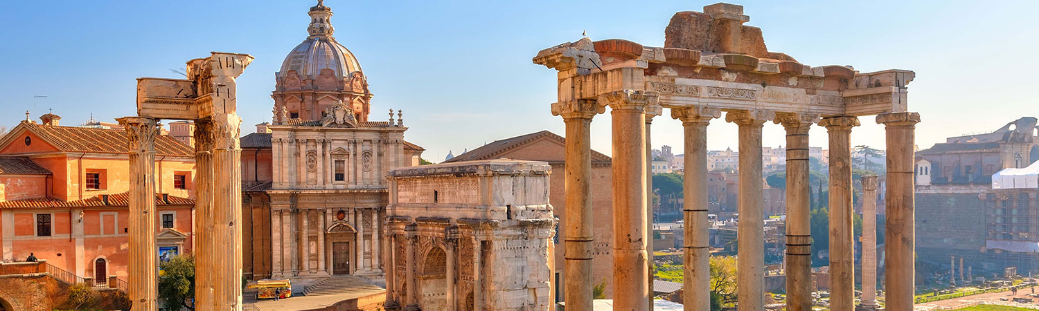 The image captures a panoramic view of the Roman Forum in Rome, Italy.
