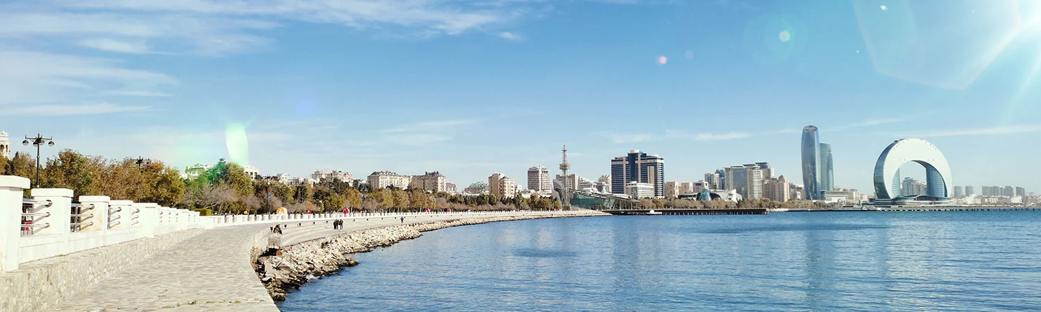 Baku's modern skyline featuring the iconic Flame Towers and Caspian Sea waterfront, a popular travel destination in Azerbaijan